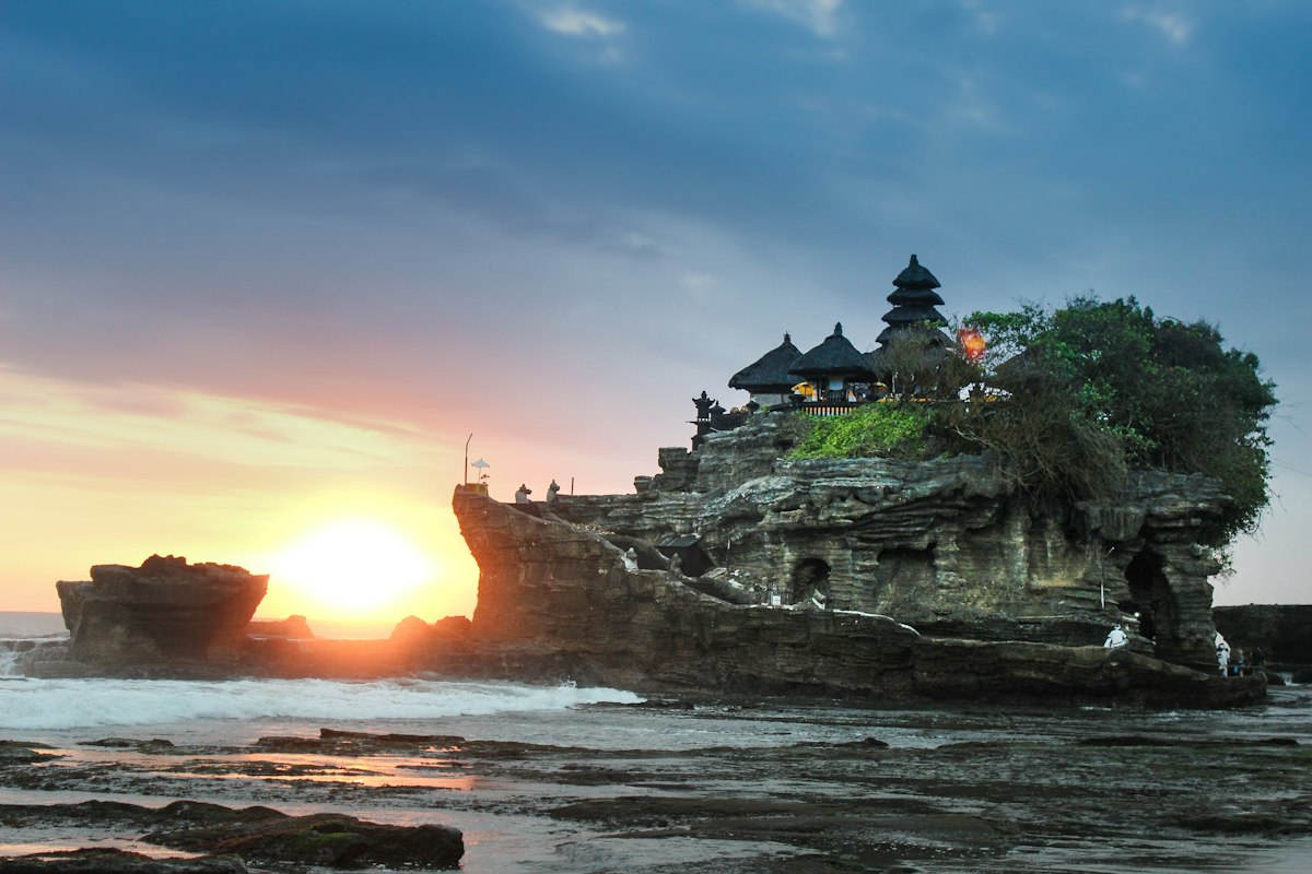 Bali coastline at sunset, temple on the rock